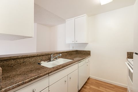 Kitchen with White Appliances and White Cabinets